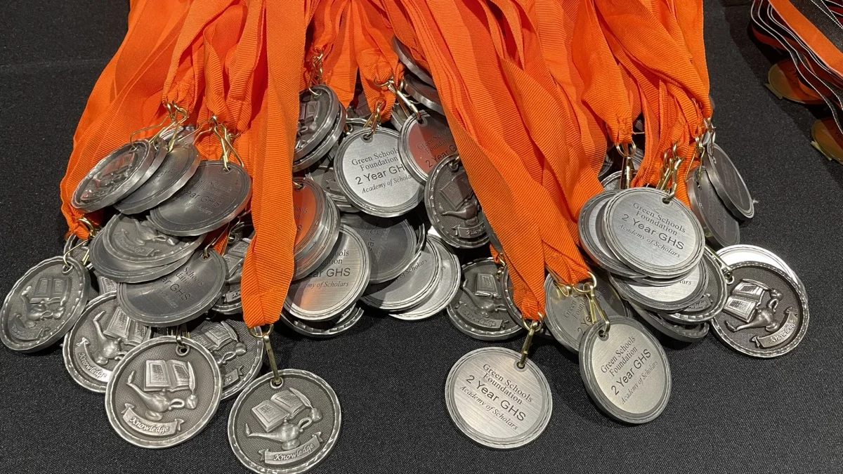 Academy of Scholars medals with orange ribbons