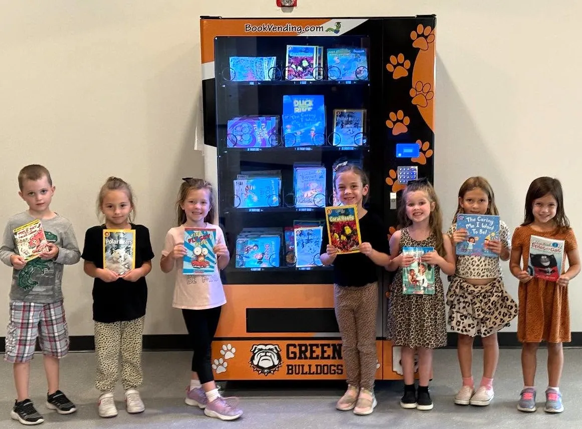 GPS Principal Award winners at the book vending machine